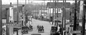 Cropped from a street view of Main Street in 1917 showing the two story Thompson Hall moved across the street by the Sons of Norway and converted to their hall. 