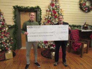 Snohomish County Clouncilman Nate Nehring and Richard Hayes presenting Community Heritage Grant check for historic preservation repairs and maintenance of D. O. Pearson House. 